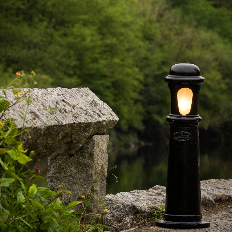 Decorative bollard light in cast iron with a frosted lens 0.7m in height.