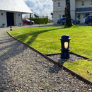 Decorative bollard light in cast iron with a frosted lens 0.43m in height.
