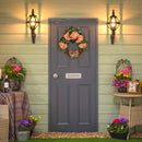 Victorian globe wall light in cast iron 0.59m in height with decorative arm.