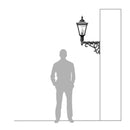 Victorian traditional cast iron wall light 0.97m in height with decorative arm.