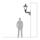 Victorian traditional cast iron wall light 1.1m in height with decorative arm.